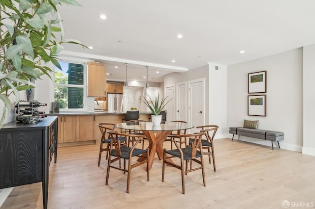 dining space with recessed lighting, visible vents, baseboards, and light wood-style flooring