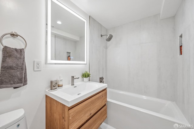 full bathroom with vanity, toilet, and washtub / shower combination