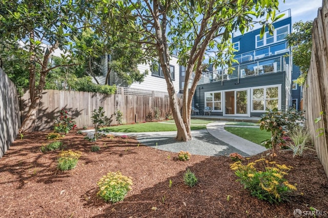 view of yard featuring a fenced backyard and a patio area