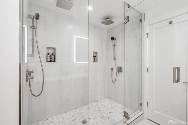 full bathroom featuring a stall shower