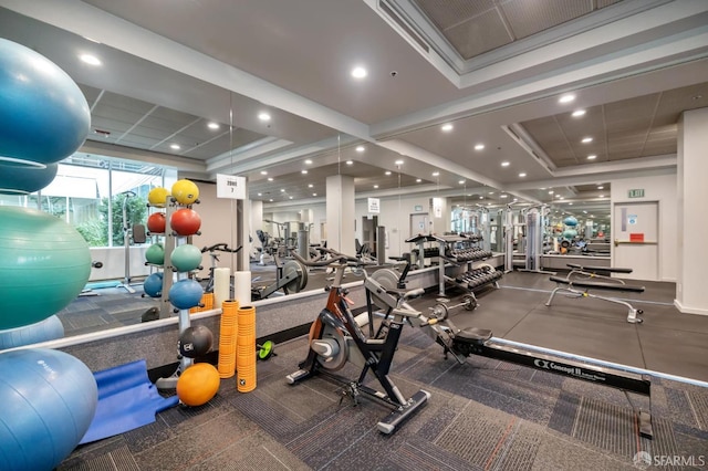 workout area with recessed lighting