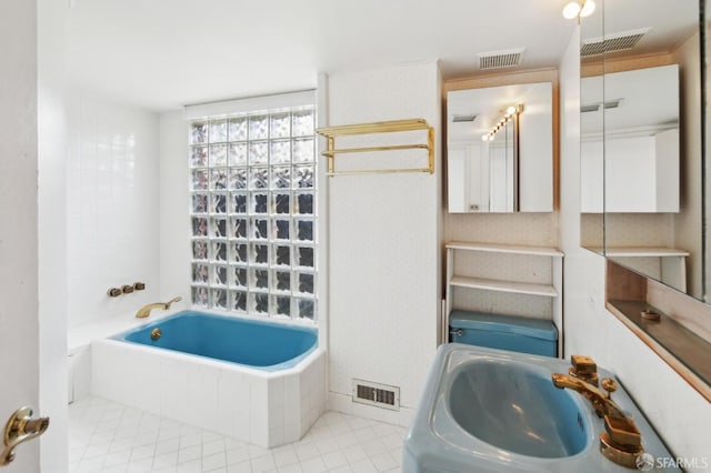199 Edgewood Ave, San Francisco, CA 94117 - full bathroom with a sink, a tub to relax in, and visible vents