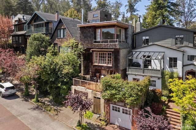 199 Edgewood Ave, San Francisco, CA 94117 - view of front of home with a garage, a balcony, and a chimney