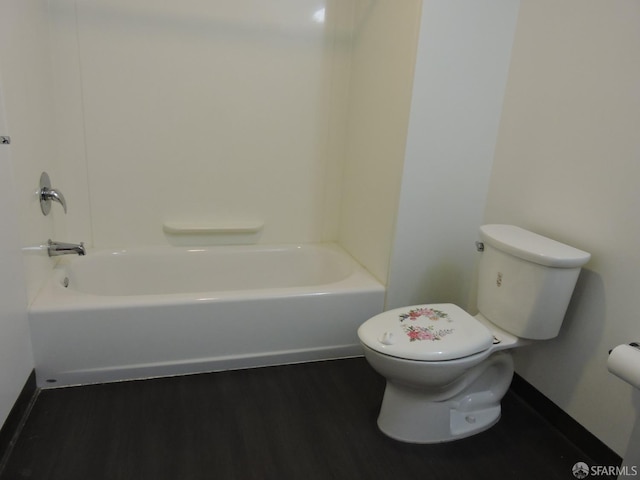 bathroom with toilet and hardwood / wood-style floors