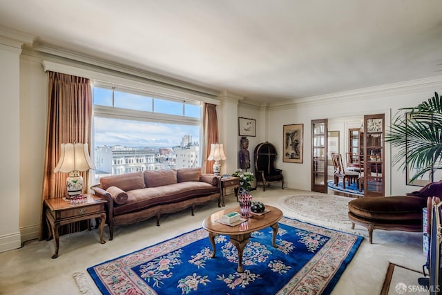 carpeted living room with baseboards, a view of city, and ornamental molding