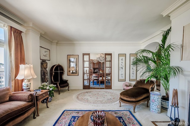 sitting room featuring a healthy amount of sunlight, carpet, and ornamental molding