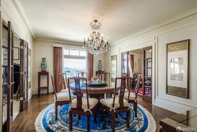 dining area with an inviting chandelier and crown molding