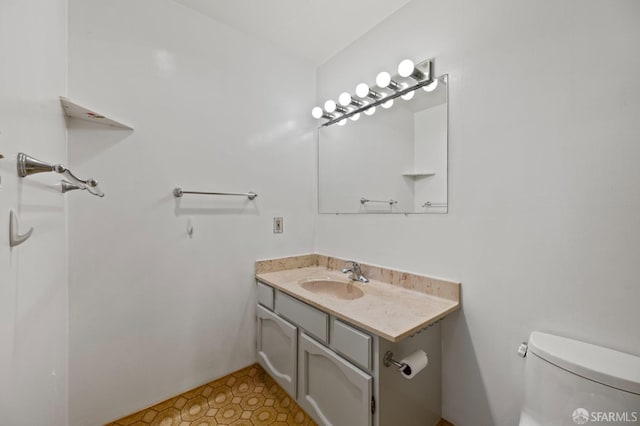 half bath with toilet and vanity