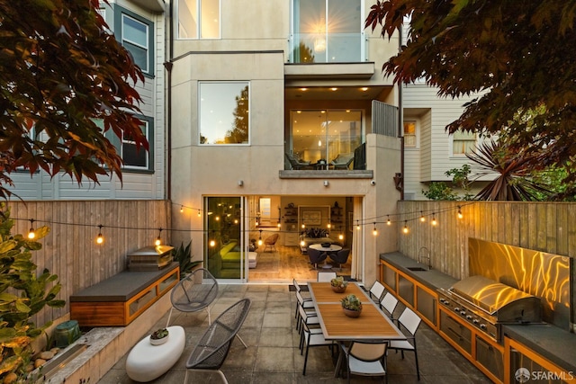 2735-2737 Baker St, San Francisco, CA 94123 - back of property featuring a sink, a patio, and stucco siding