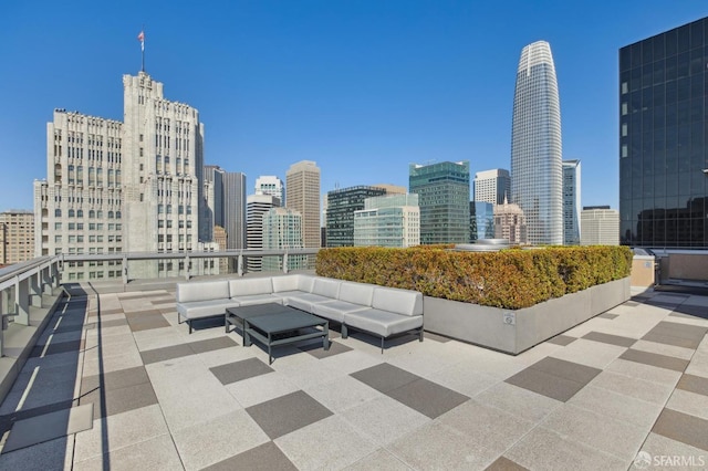 view of patio featuring outdoor lounge area and a view of city