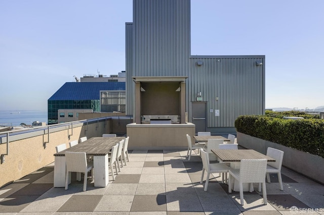 view of patio / terrace featuring exterior kitchen and outdoor dining area