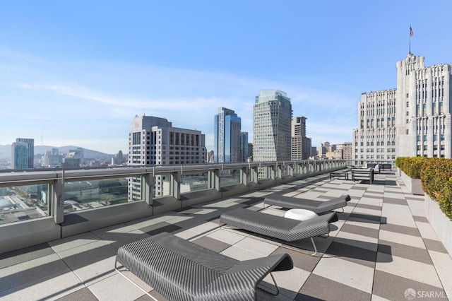 view of patio / terrace featuring a city view