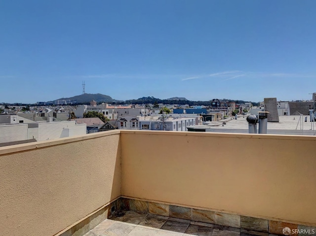 balcony featuring a mountain view