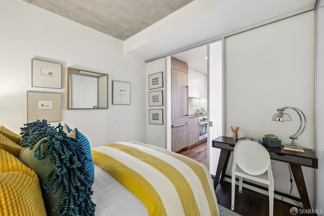 bedroom featuring wood finished floors