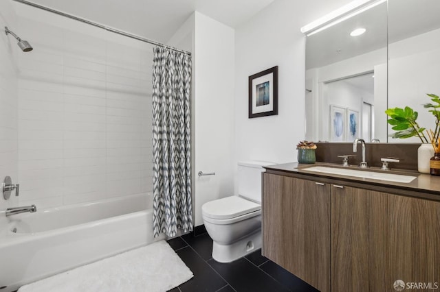 full bath featuring vanity, tile patterned floors, toilet, and shower / tub combo with curtain