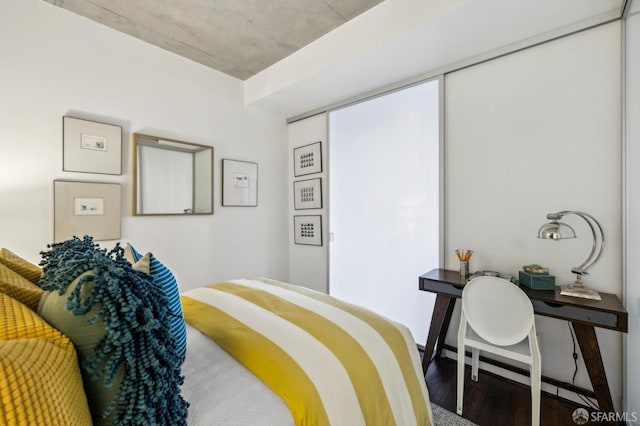 bedroom featuring wood finished floors