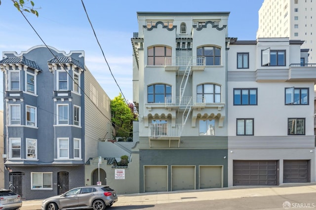1250 Vallejo St Unit 8, San Francisco, CA 94109 - view of building exterior with a garage