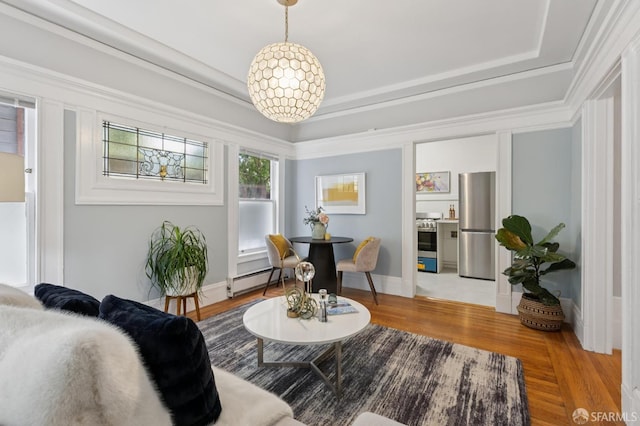 1250 Vallejo St Unit 8, San Francisco, CA 94109 - living room with a baseboard radiator, a tray ceiling, and light wood finished floors
