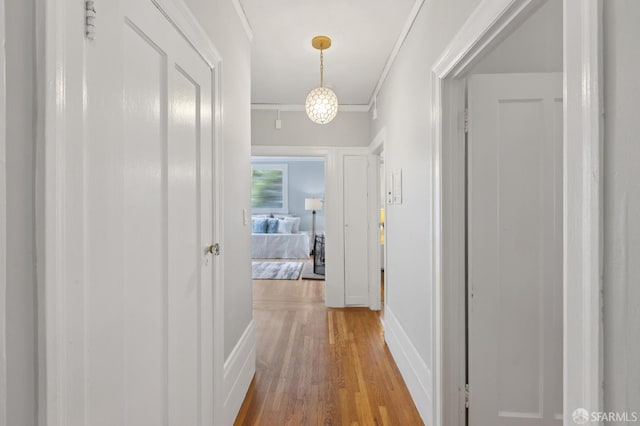 1250 Vallejo St Unit 8, San Francisco, CA 94109 - corridor featuring ornamental molding and wood finished floors