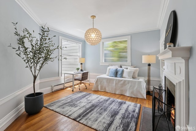 1250 Vallejo St Unit 8, San Francisco, CA 94109 - bedroom featuring ornamental molding, a warm lit fireplace, wood finished floors, and a baseboard heating unit