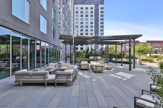 surrounding community featuring an outdoor living space and a pergola