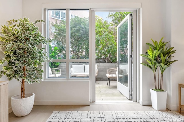 doorway to outside featuring radiator heating unit