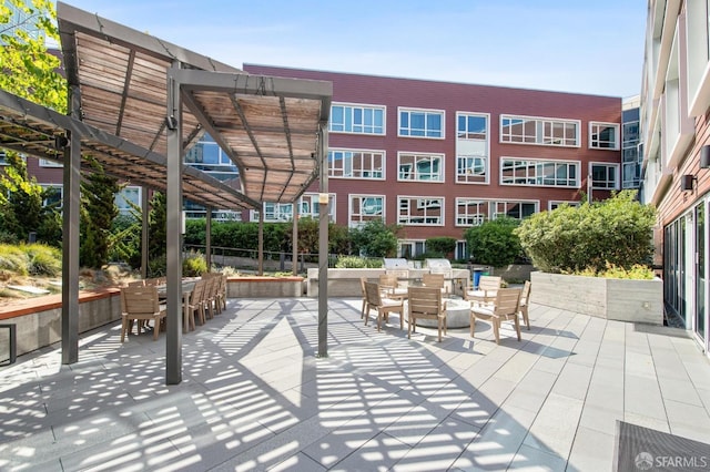 exterior space with outdoor dining area and a patio area