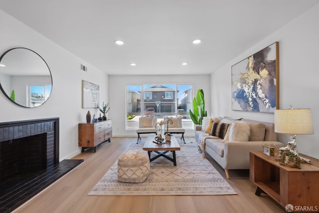 living room featuring light wood-type flooring