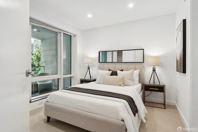 carpeted bedroom with recessed lighting and baseboards