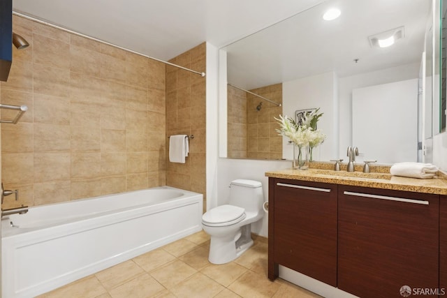 bathroom featuring shower / bath combination, toilet, vanity, and tile patterned flooring