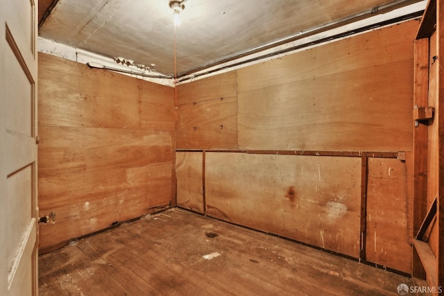 below grade area featuring wood finished floors