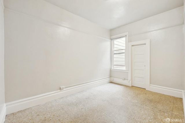 empty room featuring tile patterned floors