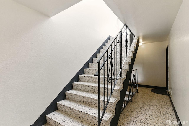 278 7th Ave, San Francisco, CA 94118 - stairs featuring baseboards and speckle patterned floor
