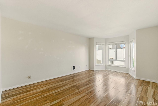 278 7th Ave, San Francisco, CA 94118 - empty room featuring wood finished floors and baseboards