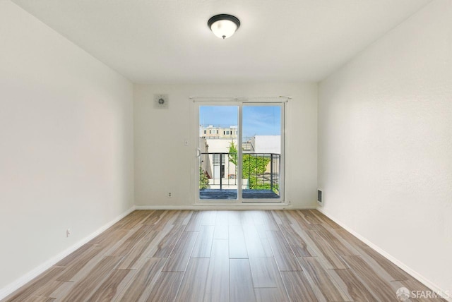 278 7th Ave, San Francisco, CA 94118 - empty room featuring wood finished floors and baseboards