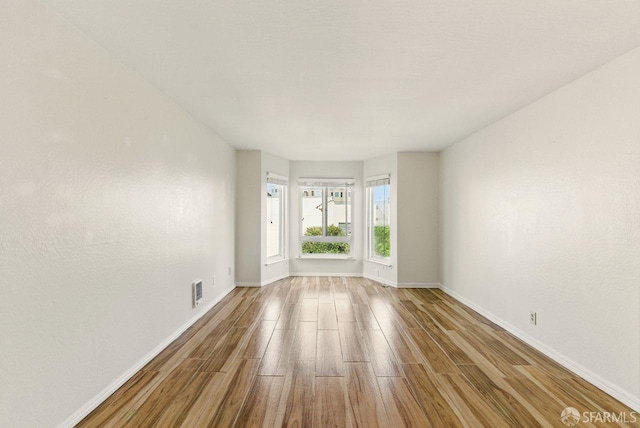 278 7th Ave, San Francisco, CA 94118 - unfurnished room featuring wood finished floors