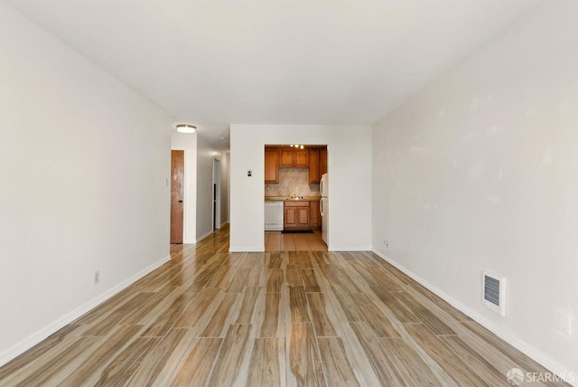 278 7th Ave, San Francisco, CA 94118 - unfurnished living room featuring light wood finished floors