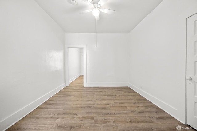 unfurnished room with ceiling fan and light hardwood / wood-style flooring