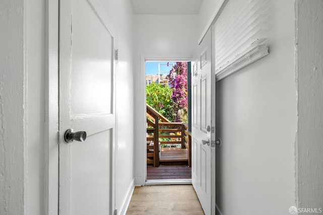 doorway with light hardwood / wood-style floors