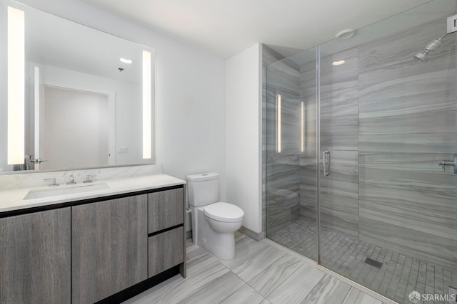 full bath featuring a shower stall, toilet, and vanity