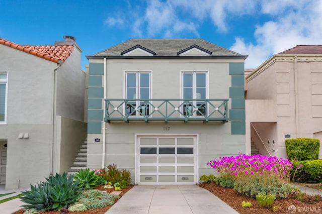 117 Meadowbrook Dr, San Francisco, CA 94132 - view of front of house featuring stairs, stucco siding, an attached garage, a balcony, and driveway
