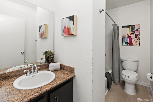 1603 18th St, San Francisco, CA 94107 - bathroom with vanity, wood finished floors, and shower / tub combo