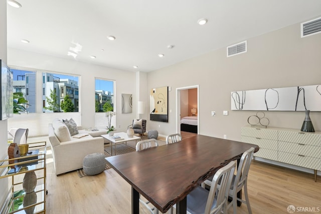 dining space with visible vents, recessed lighting, and light wood-type flooring