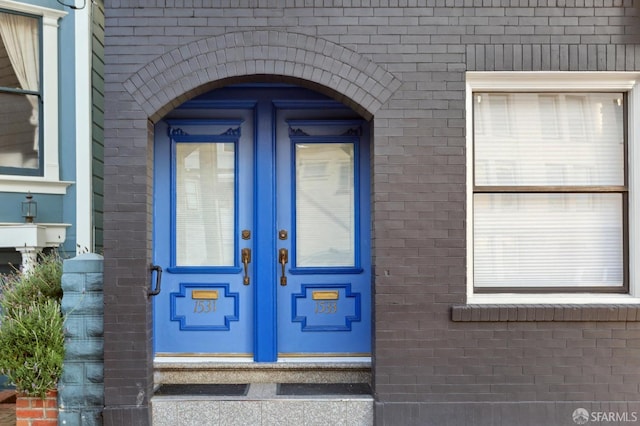 property entrance featuring french doors