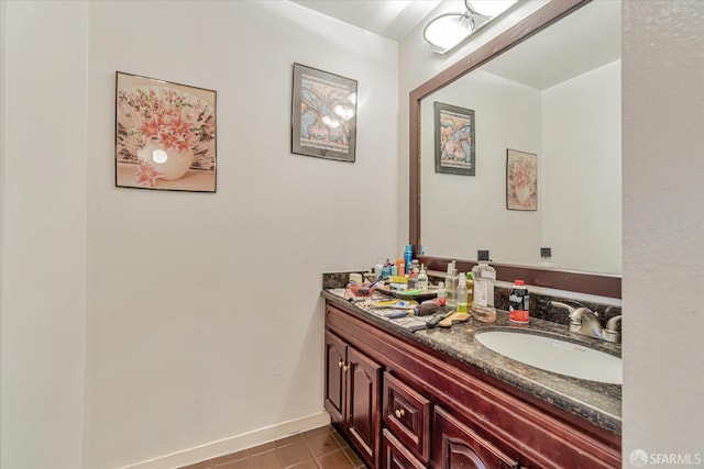 bathroom with tile patterned flooring and vanity