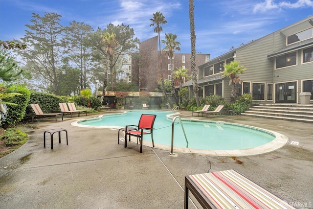 view of pool with a patio area