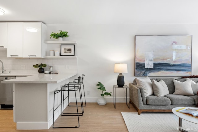 2364 Pacific Ave Unit 3, San Francisco, CA 94115 - living area featuring light wood-type flooring and baseboards