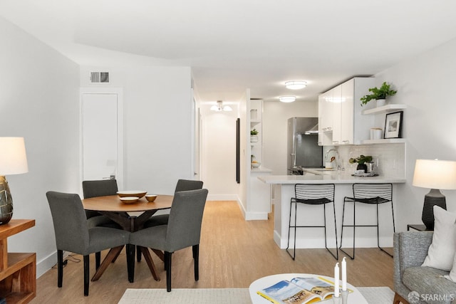 2364 Pacific Ave Unit 3, San Francisco, CA 94115 - dining room featuring light wood finished floors and baseboards