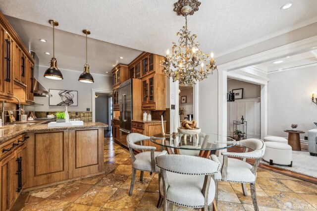 68 Castro St, San Francisco, CA 94114 - dining space with stone tile flooring, a chandelier, crown molding, recessed lighting, and a textured ceiling