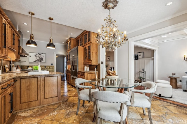 68 Castro St, San Francisco, CA 94114 - dining space with stone tile flooring, a chandelier, crown molding, recessed lighting, and a textured ceiling